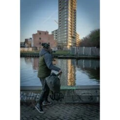 Trakker Downpour Roll-Up Carryall 25 Trakker Downpour Roll-Up Carryall -Fox Tienda de ventas Trakker NXG Luggage Lifestyle Shoot Feb 181 550x550h