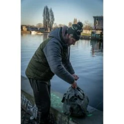 Trakker Downpour Roll-Up Carryall 37 Trakker Downpour Roll-Up Carryall -Fox Tienda de ventas Trakker NXG Luggage Lifestyle Shoot Feb 192 550x550h