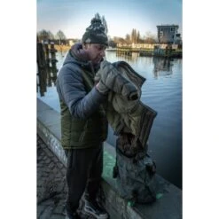 Trakker Downpour Roll-Up Carryall 38 Trakker Downpour Roll-Up Carryall -Fox Tienda de ventas Trakker NXG Luggage Lifestyle Shoot Feb 193 550x550h